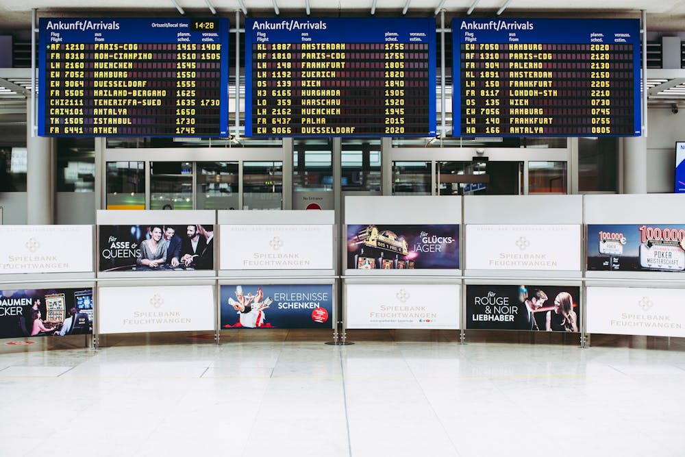 Departures and arrivals screens at an airport